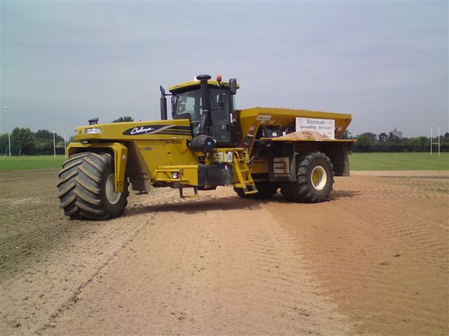 terragator spreading sand on pitch for drainage